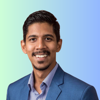 Headshot photo of Mevan Peiris with a blue gradient background